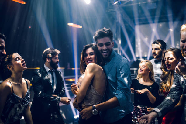 Shot of a young couple dancing in the nightclub